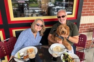 Rick Orlemanski with his wife, Karen Orlemanski, and their dog, Molly